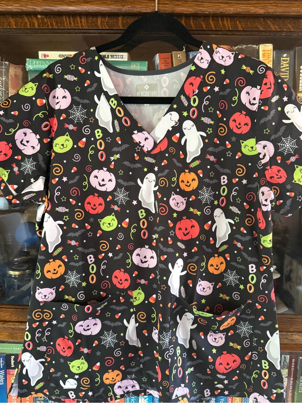 Med Couture Black Halloween Print Short Sleeve Scrub Top with Ghosts & Pumpkins